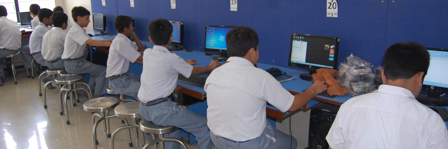 Students using computers in the school computer laboratory