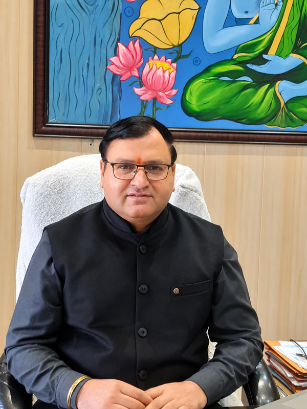 Sh. Naresh Kumar Sharma, Director and Principal