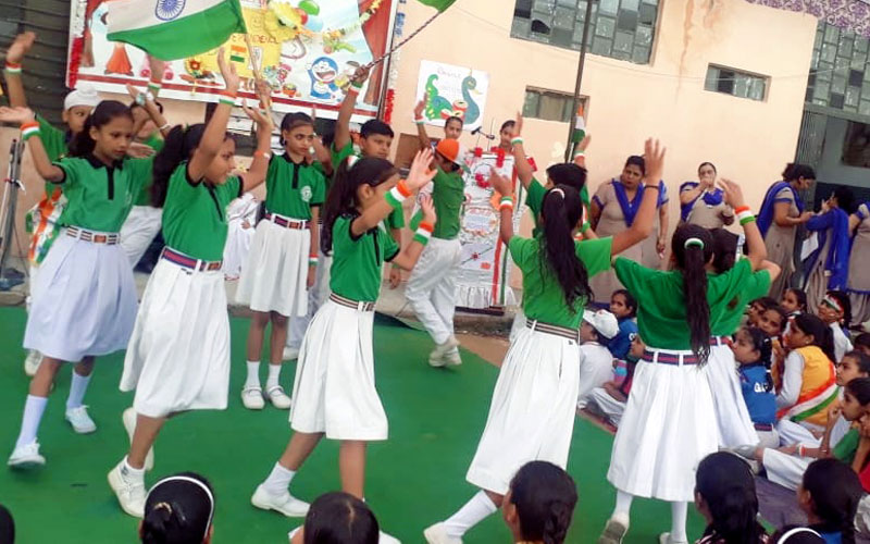 SPS students taking part in a cultural performance